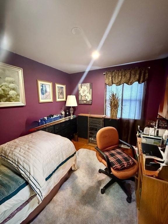 bedroom with light wood-style flooring