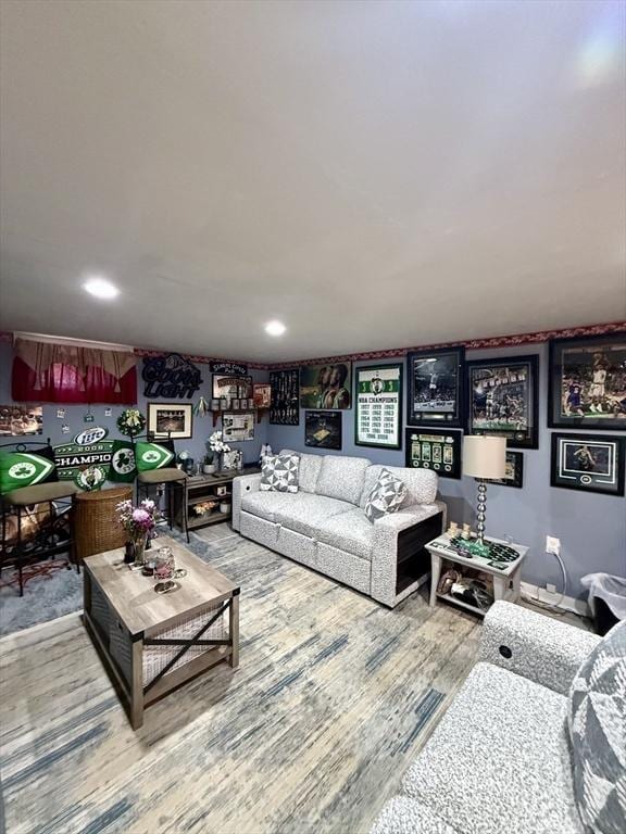 living room featuring recessed lighting and wood finished floors