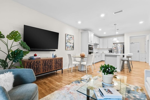 living room featuring light hardwood / wood-style flooring