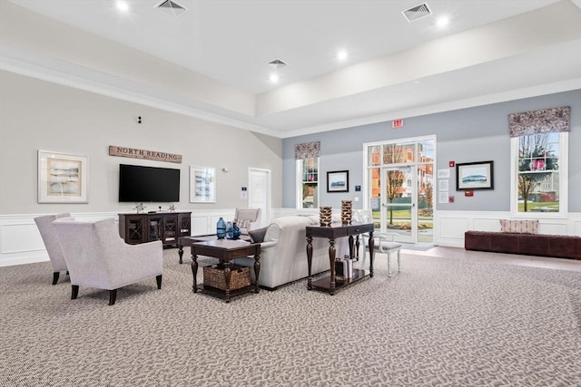 living room featuring light carpet