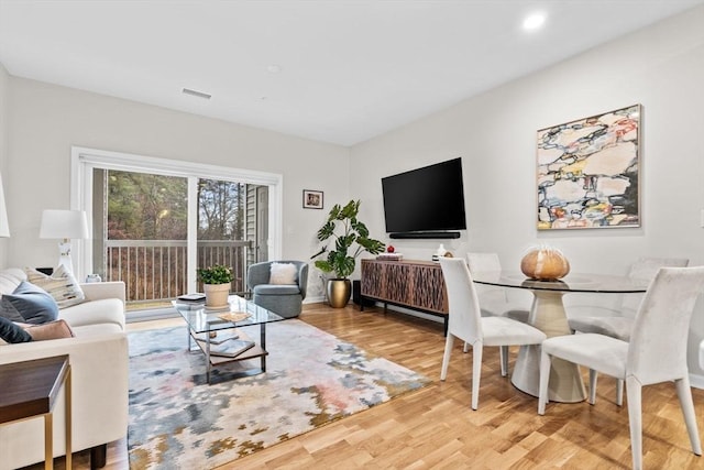 living room with hardwood / wood-style floors