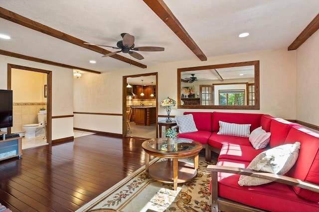 living room featuring ceiling fan, beamed ceiling, hardwood / wood-style flooring, baseboards, and recessed lighting