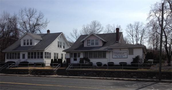 view of new england style home