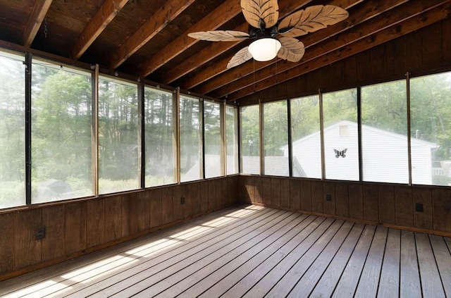 unfurnished sunroom with ceiling fan and healthy amount of natural light