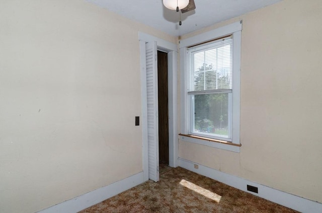 spare room with carpet flooring