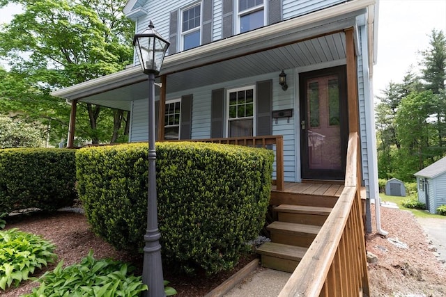doorway to property featuring a porch
