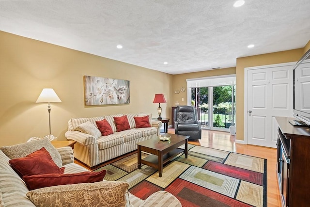 living room with light hardwood / wood-style floors