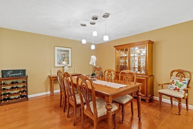 dining space featuring hardwood / wood-style flooring