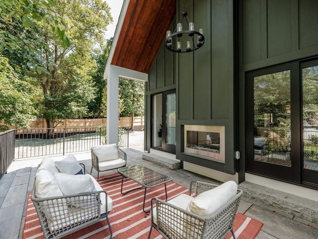 view of patio / terrace with a large fireplace