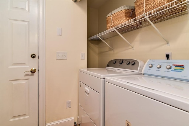 laundry area featuring laundry area and washing machine and clothes dryer