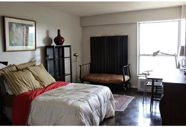 111 Perkins St Unit 108, Boston, MA 02130 - bedroom featuring wood finished floors