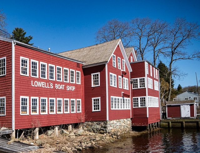 view of home's exterior featuring a water view