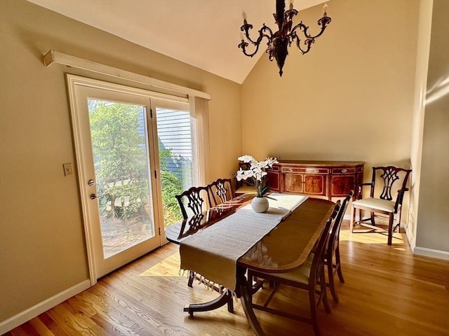 35 Mitchell Grant Way, Bedford, MA 01730 - dining area with a chandelier, light wood-type flooring, and vaulted ceiling