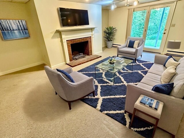 35 Mitchell Grant Way, Bedford, MA 01730 - living room with carpet floors and a fireplace