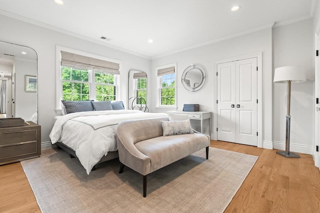 382 Lee St, Brookline, MA 02445 - bedroom featuring ornamental molding, light wood finished floors, recessed lighting, and baseboards