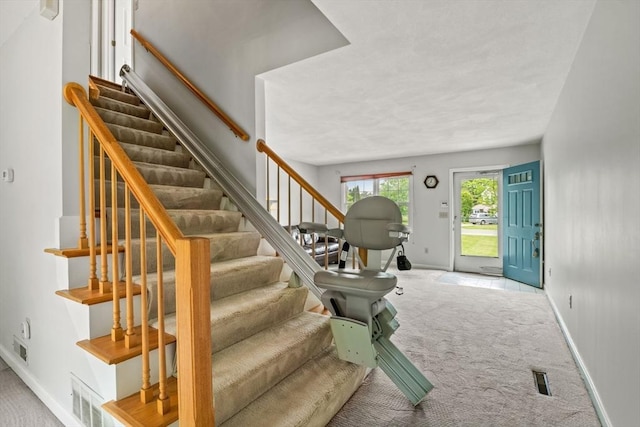 20 Ipswich Woods Dr Unit 20, Ipswich, MA 01938 - entryway featuring carpet floors, stairs, and baseboards