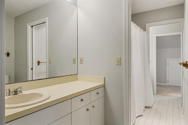20 Ipswich Woods Dr Unit 20, Ipswich, MA 01938 - full bathroom featuring vanity, toilet, tile patterned floors, and baseboards