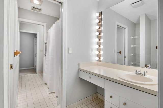 20 Ipswich Woods Dr Unit 20, Ipswich, MA 01938 - bathroom featuring tile patterned floors, vanity, and baseboards