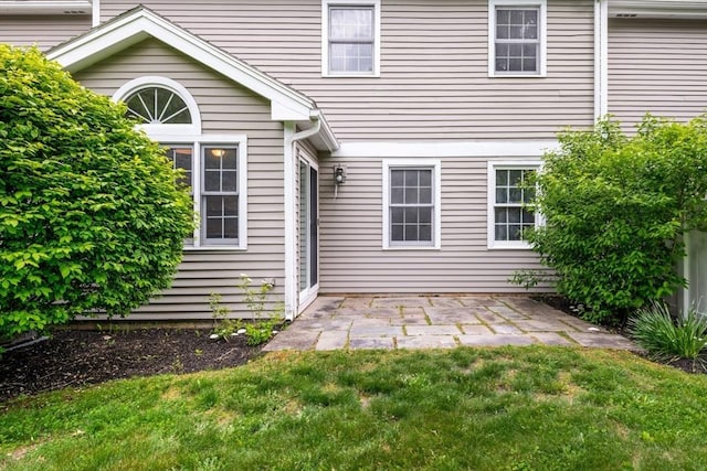 20 Ipswich Woods Dr Unit 20, Ipswich, MA 01938 - back of house with a yard and a patio area