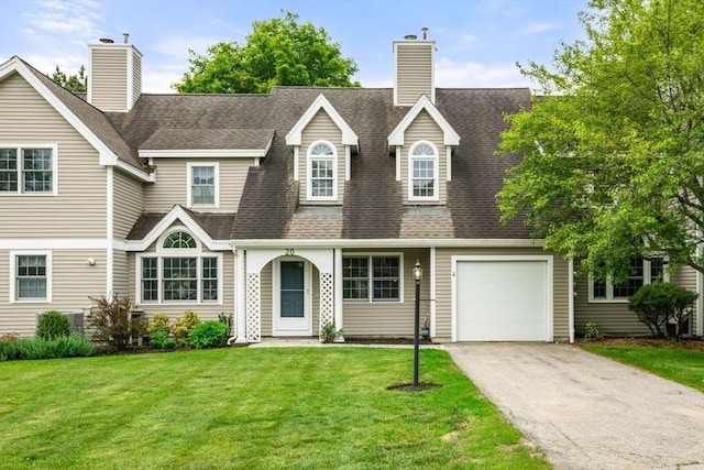 20 Ipswich Woods Dr Unit 20, Ipswich, MA 01938 - view of front of home with asphalt driveway, a front yard, and roof with shingles