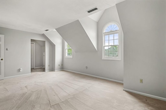 20 Ipswich Woods Dr Unit 20, Ipswich, MA 01938 - bonus room with healthy amount of natural light, carpet flooring, vaulted ceiling, and baseboards