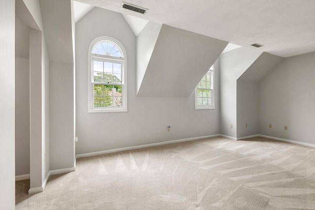 20 Ipswich Woods Dr Unit 20, Ipswich, MA 01938 - bonus room featuring lofted ceiling, carpet flooring, plenty of natural light, and baseboards
