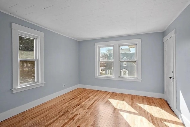 unfurnished room featuring light hardwood / wood-style flooring