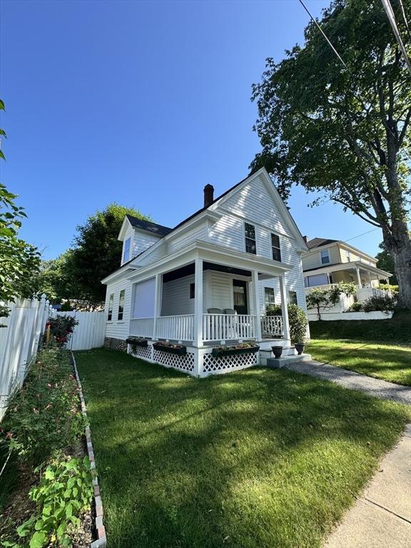 2 Northrop St, Hopedale, MA 01747 - view of front of property featuring covered porch and a chimney
