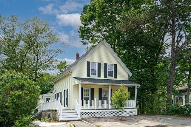 362 Commercial St, Braintree, MA 02184 - view of front of home with a porch and a chimney