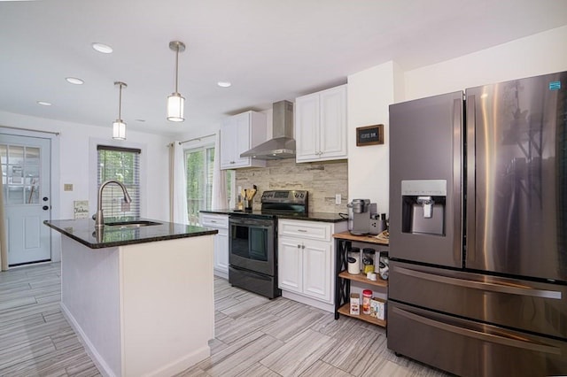362 Commercial St, Braintree, MA 02184 - kitchen featuring stainless steel appliances, a sink, wall chimney range hood, white cabinetry, and backsplash
