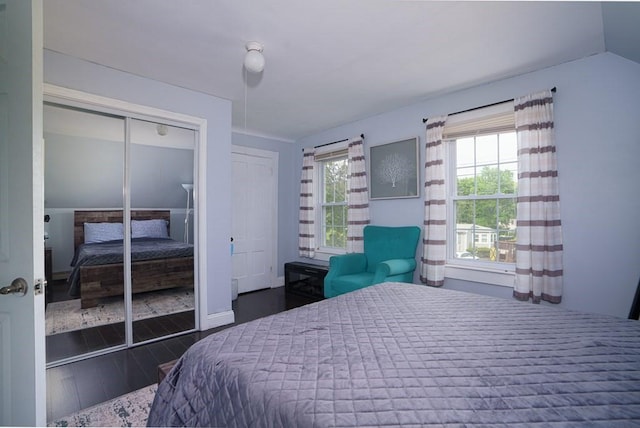 362 Commercial St, Braintree, MA 02184 - bedroom featuring wood finished floors, a closet, and vaulted ceiling