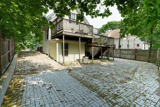362 Commercial St, Braintree, MA 02184 - rear view of property featuring a deck, stairs, and a fenced backyard