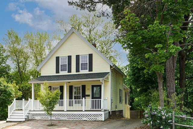 362 Commercial St, Braintree, MA 02184 - view of front of house featuring covered porch and a chimney