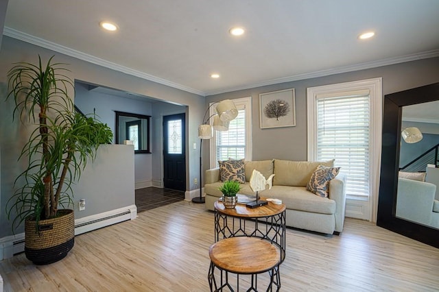 362 Commercial St, Braintree, MA 02184 - living room with a baseboard heating unit, crown molding, light wood finished floors, stairs, and recessed lighting