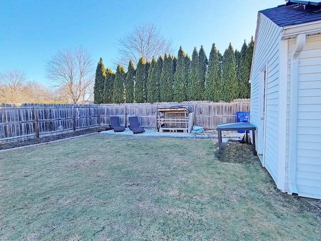 view of yard featuring a fenced backyard