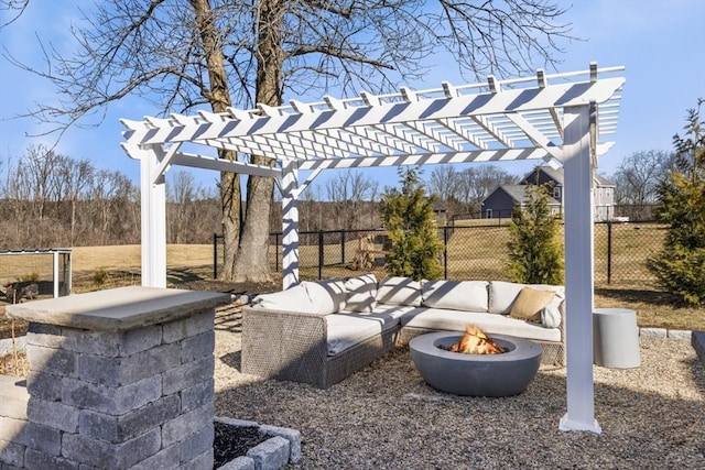 view of patio / terrace featuring an outdoor fire pit, a pergola, and fence