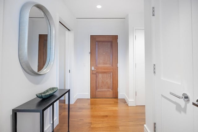 hallway featuring light hardwood / wood-style flooring