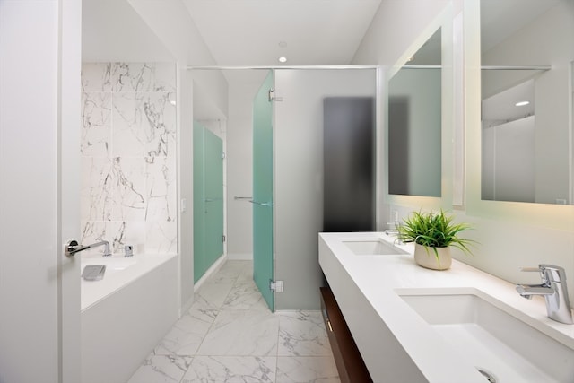 bathroom featuring vanity and shower with separate bathtub