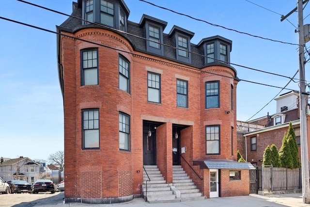 103-105 Broadway, Chelsea, MA 02150 - multi unit property featuring brick siding and mansard roof