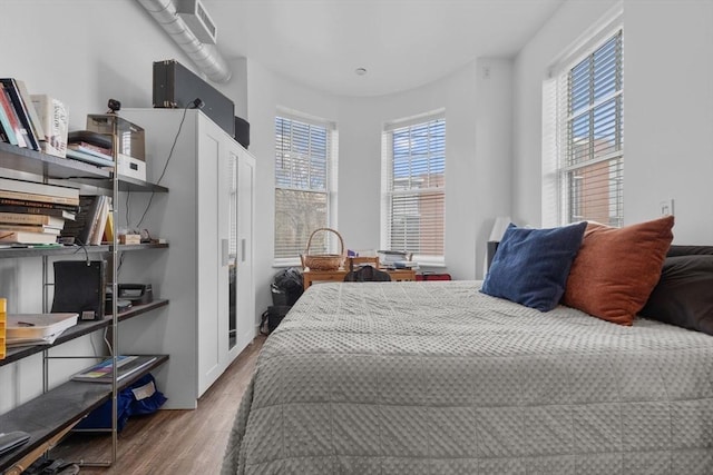103-105 Broadway, Chelsea, MA 02150 - bedroom with wood finished floors