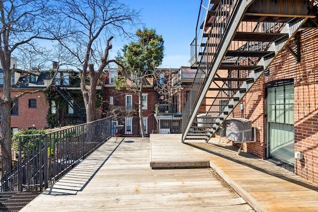 103-105 Broadway, Chelsea, MA 02150 - wooden terrace featuring stairs