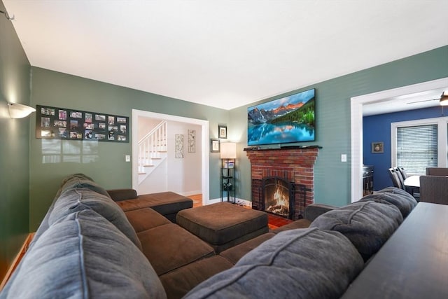 15 W St, Paxton, MA 01612 - living area featuring stairs, a fireplace, and wood finished floors