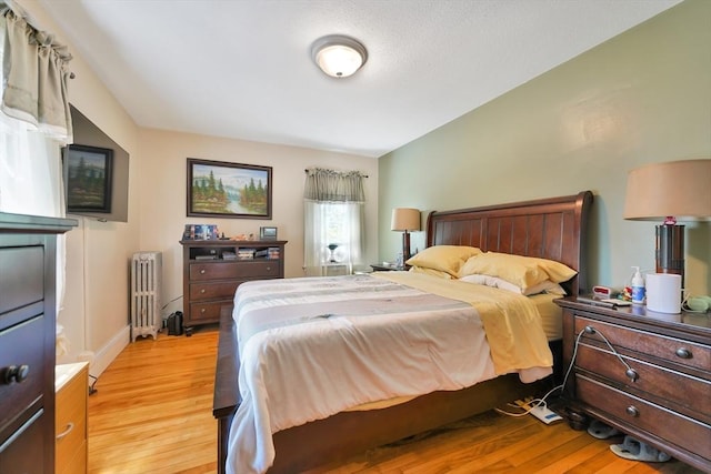 15 W St, Paxton, MA 01612 - bedroom featuring radiator heating unit and light wood-style flooring