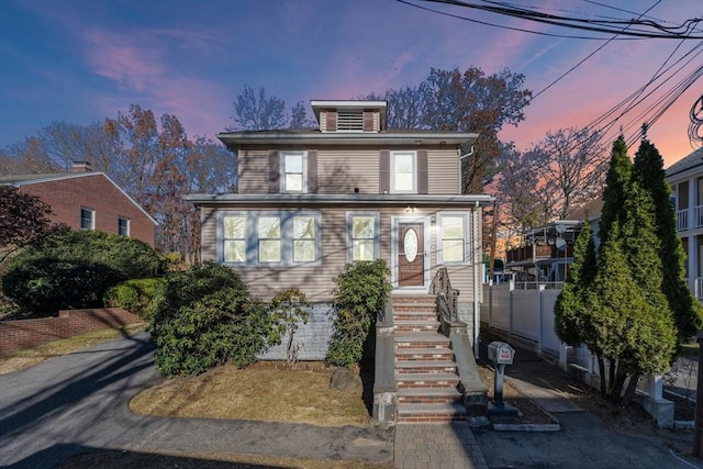 view of american foursquare style home