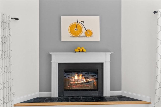 8 Mill River Ln, Rowley, MA 01969 - detailed view of a fireplace with flush hearth and baseboards