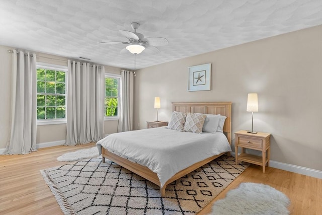 8 Mill River Ln, Rowley, MA 01969 - bedroom with wood finished floors and a ceiling fan