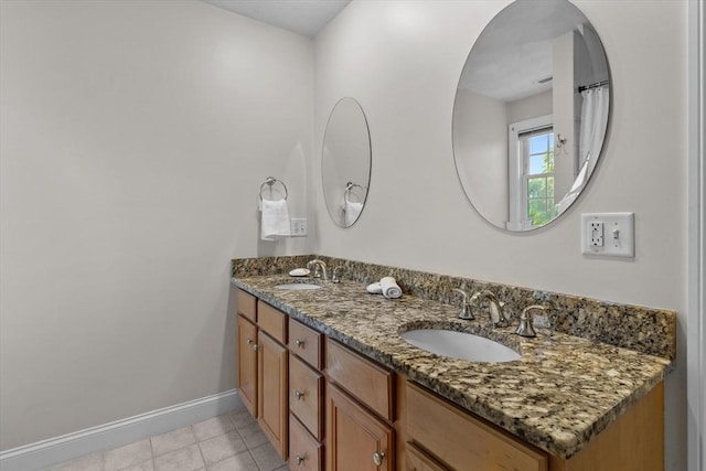 8 Mill River Ln, Rowley, MA 01969 - full bath with double vanity and tile patterned flooring