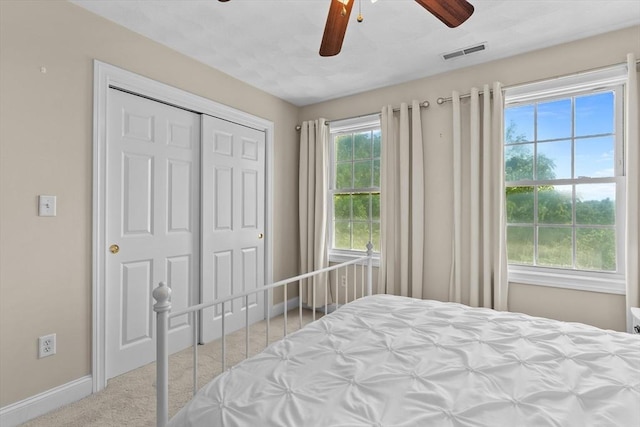 8 Mill River Ln, Rowley, MA 01969 - carpeted bedroom featuring a ceiling fan and a closet