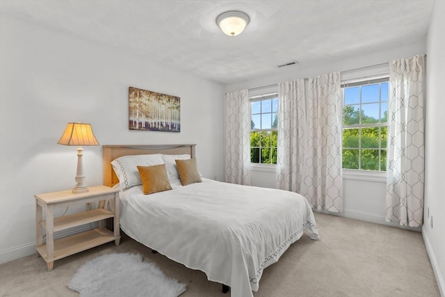 8 Mill River Ln, Rowley, MA 01969 - carpeted bedroom featuring baseboards