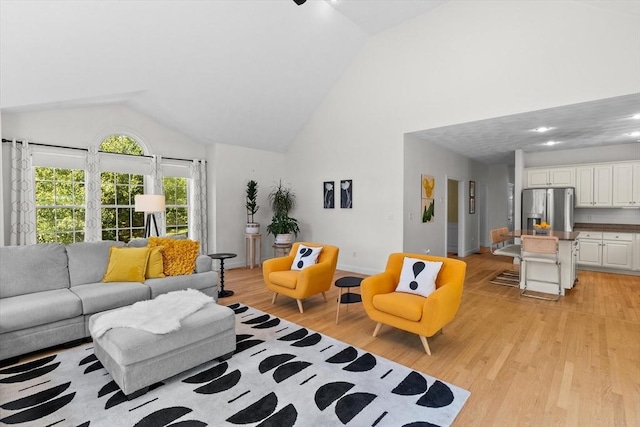 8 Mill River Ln, Rowley, MA 01969 - living room featuring light wood-style flooring and high vaulted ceiling